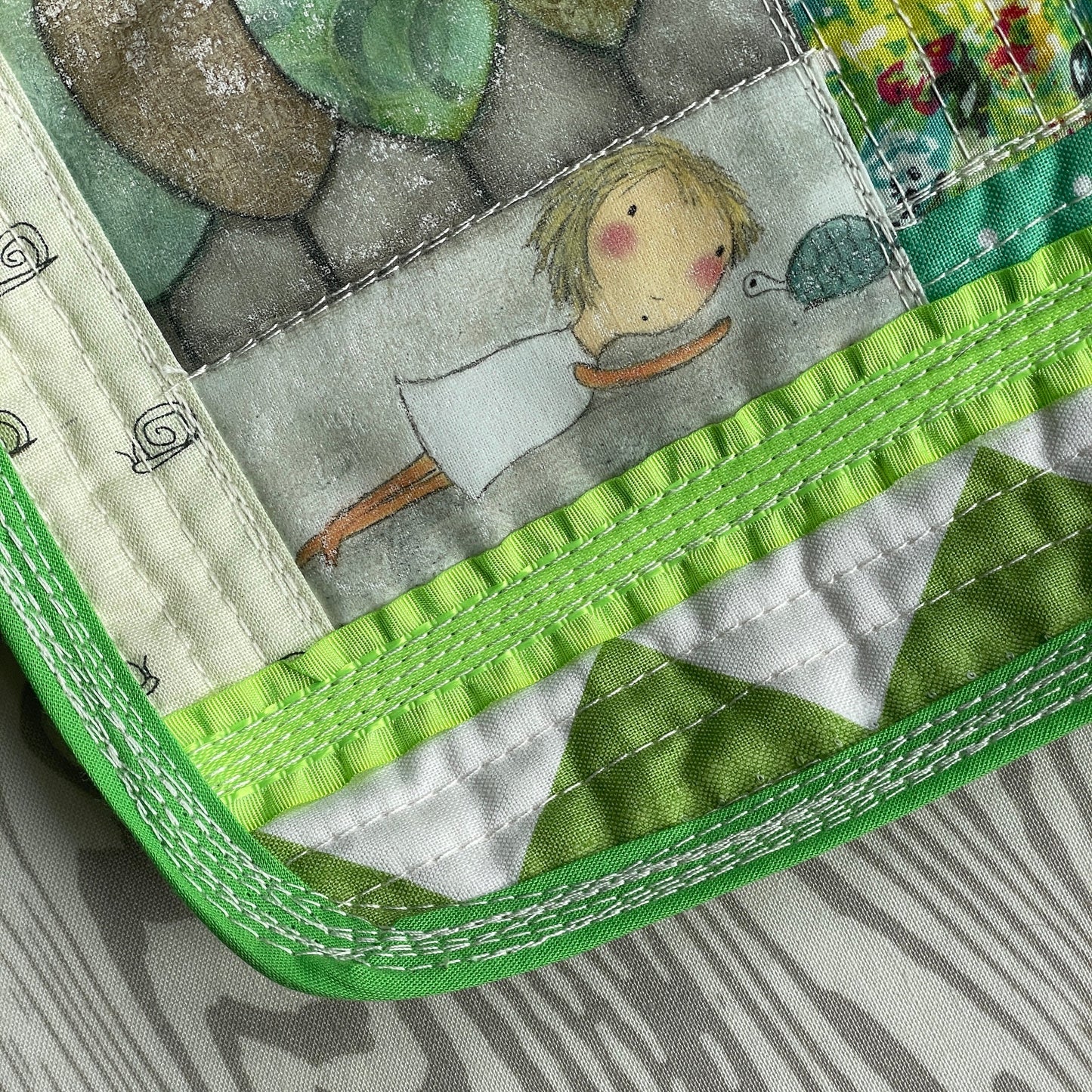 Little Turtle Girl green quilted mugrug | artsy fabric drink coaster | patchwork snack mat | scrappy washable placemat | cute mini quilt