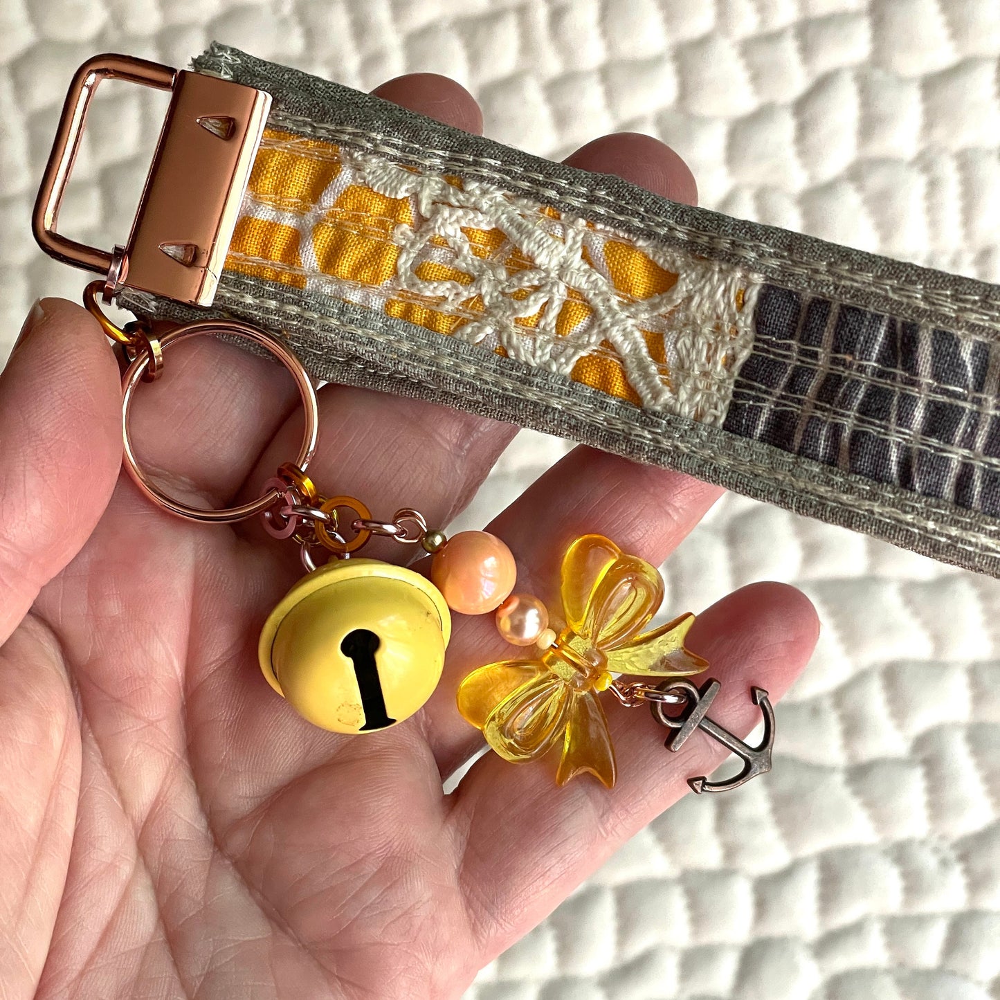 Quilted Fabric Keychain with bells & bows for fidget fingers | scrappy key fob by / for the neuro spicy | made in Michigan keyring holder