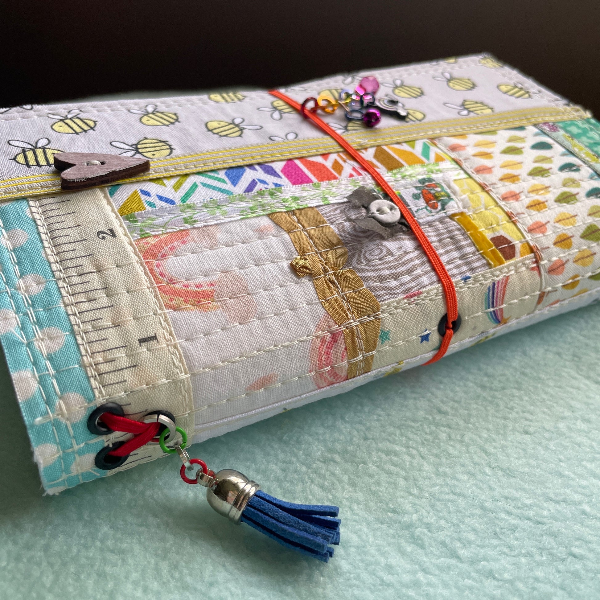 refillable book cover in rainbow fabric